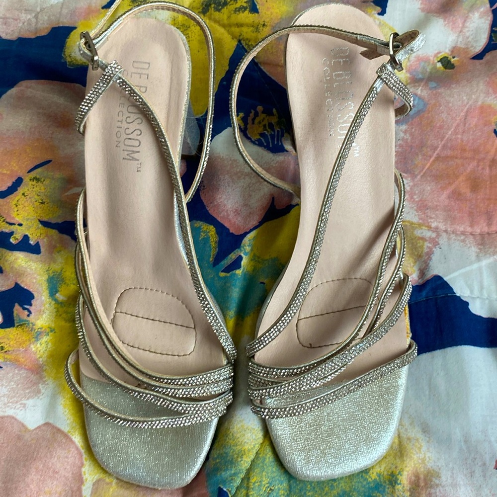Silver Heals from DE BLOSSOM COLLECTIONS, worn once for homecoming. Size 8!